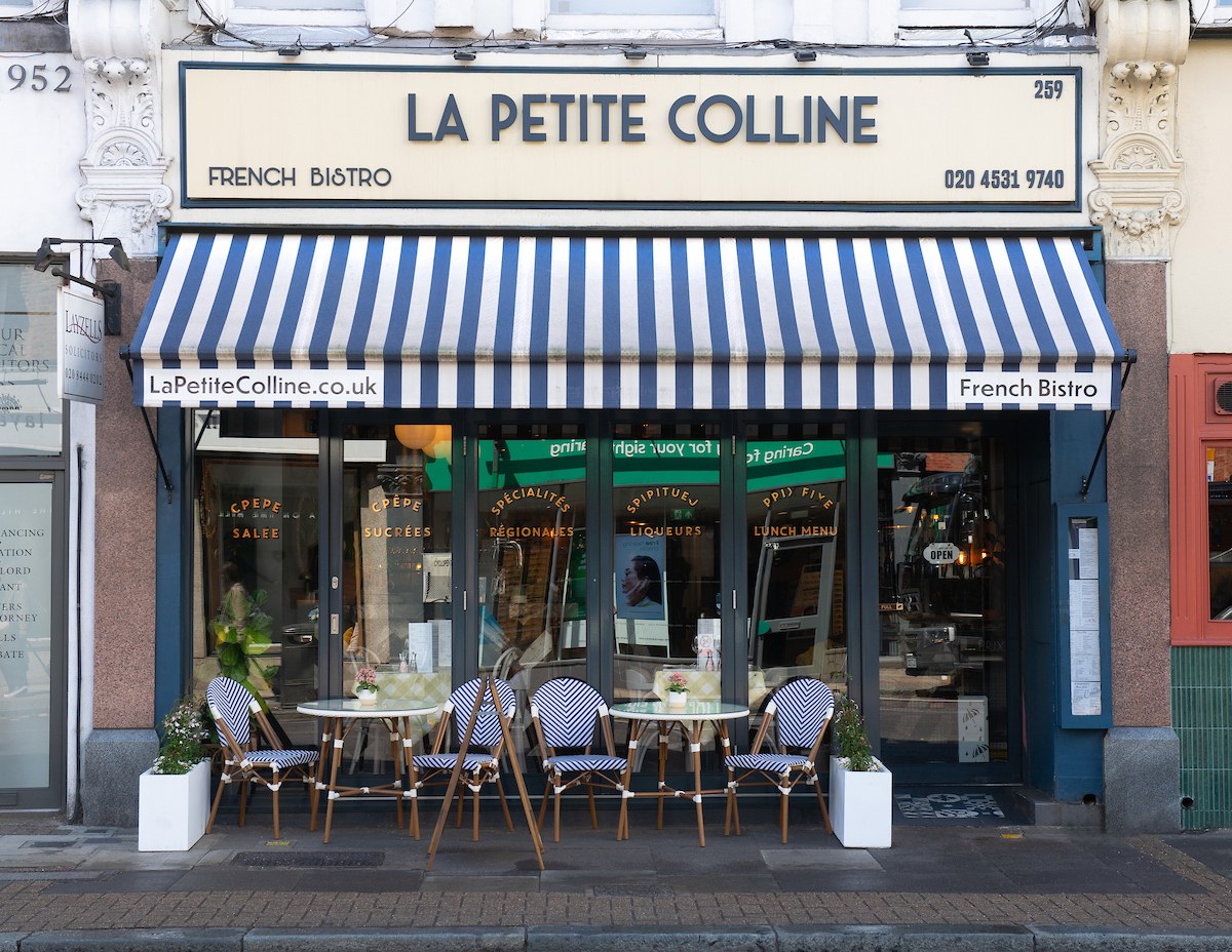 Bistro exterior striped awning at La Petite Colline, Muswell Hill
