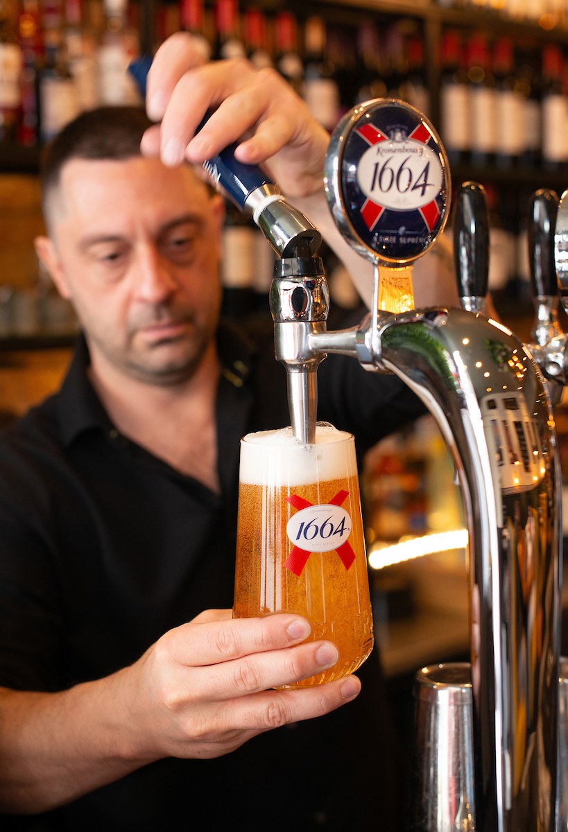 Pouring draught beer at La Petite Colline, Muswell Hill