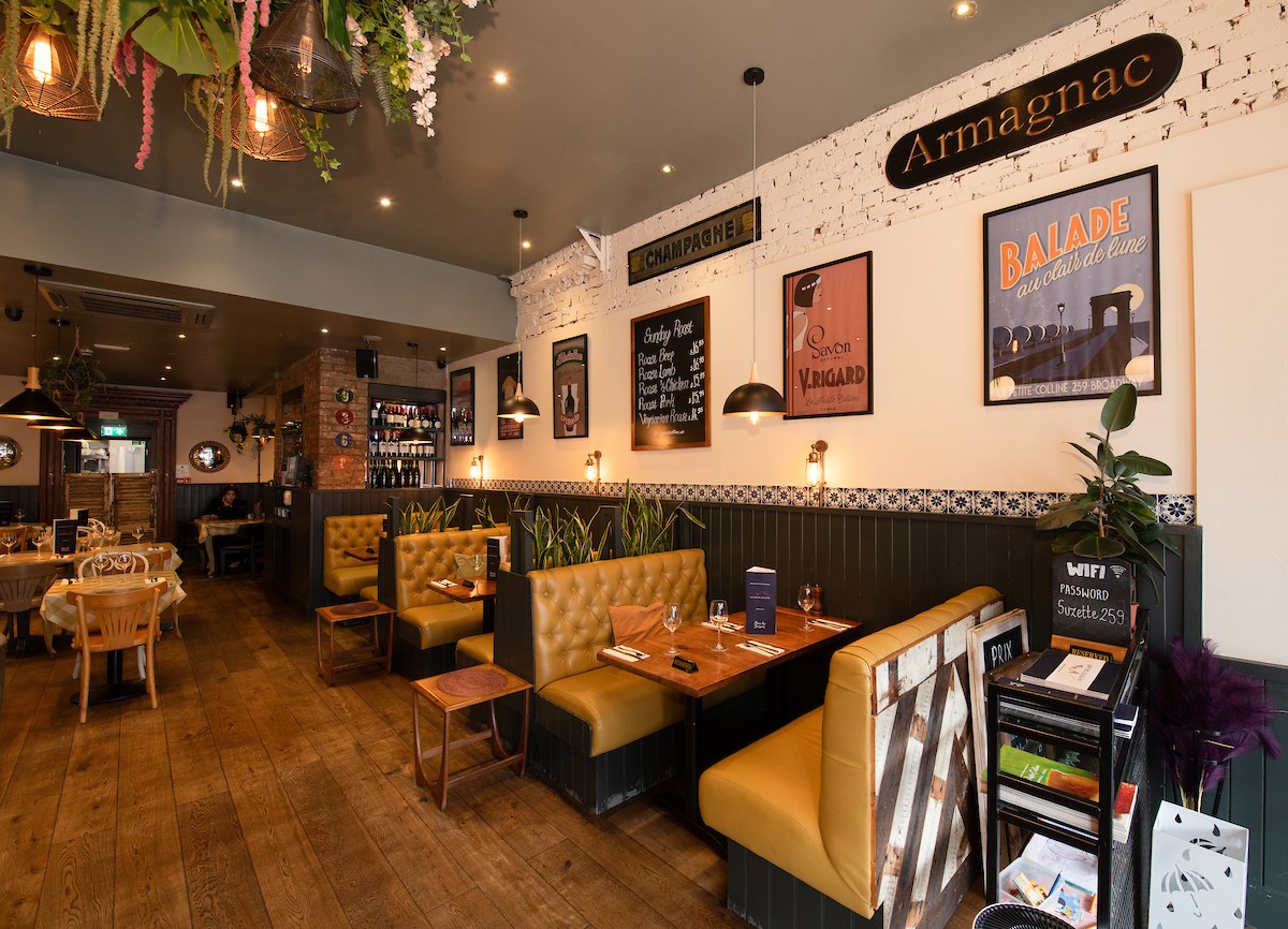 Velvet booth seating at La Petite Colline, Muswell Hill